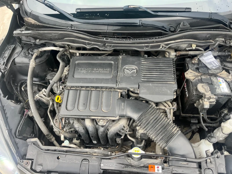 Mazda 2 1.3i , снимка 9 - Автомобили и джипове - 53101289