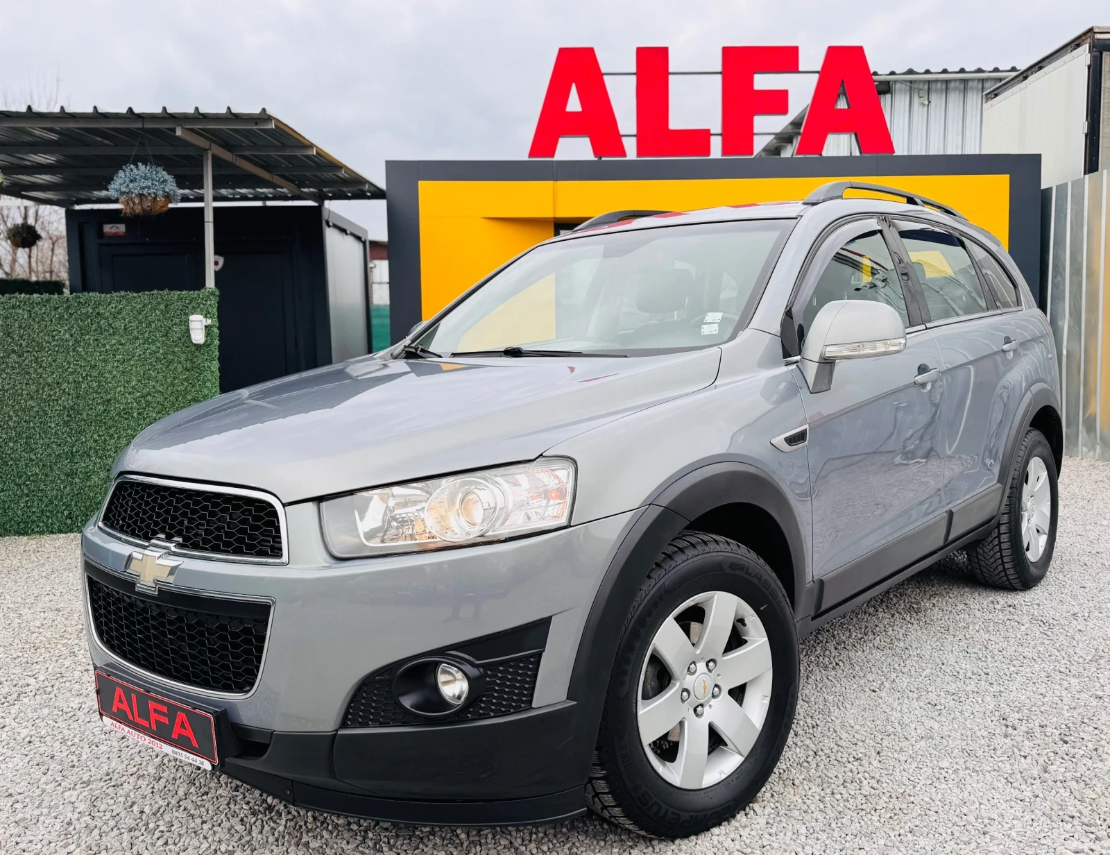 Chevrolet Captiva 2.2d/ТЕМПОМАТ/НАПЪЛНО ОБСЛУЖЕНА/ТОП КОЛА///, снимка 2 - Автомобили и джипове - 53903112