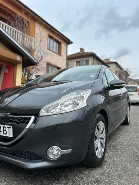 Обява за продажба на Peugeot 208 1.2i ~8 499 лв. - изображение 1