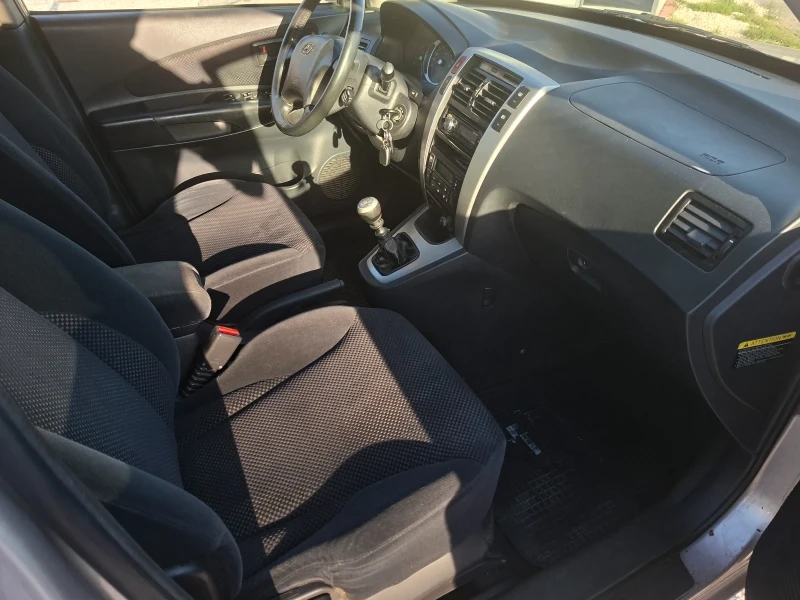 Hyundai Tucson 2.0CRD  140кс 2WD, снимка 12 - Автомобили и джипове - 53575879