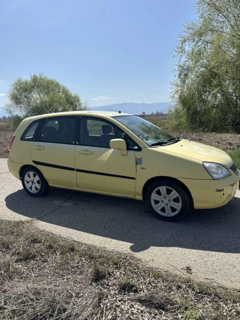 Suzuki Liana КЛИМАТИК , снимка 3 - Автомобили и джипове - 49608651