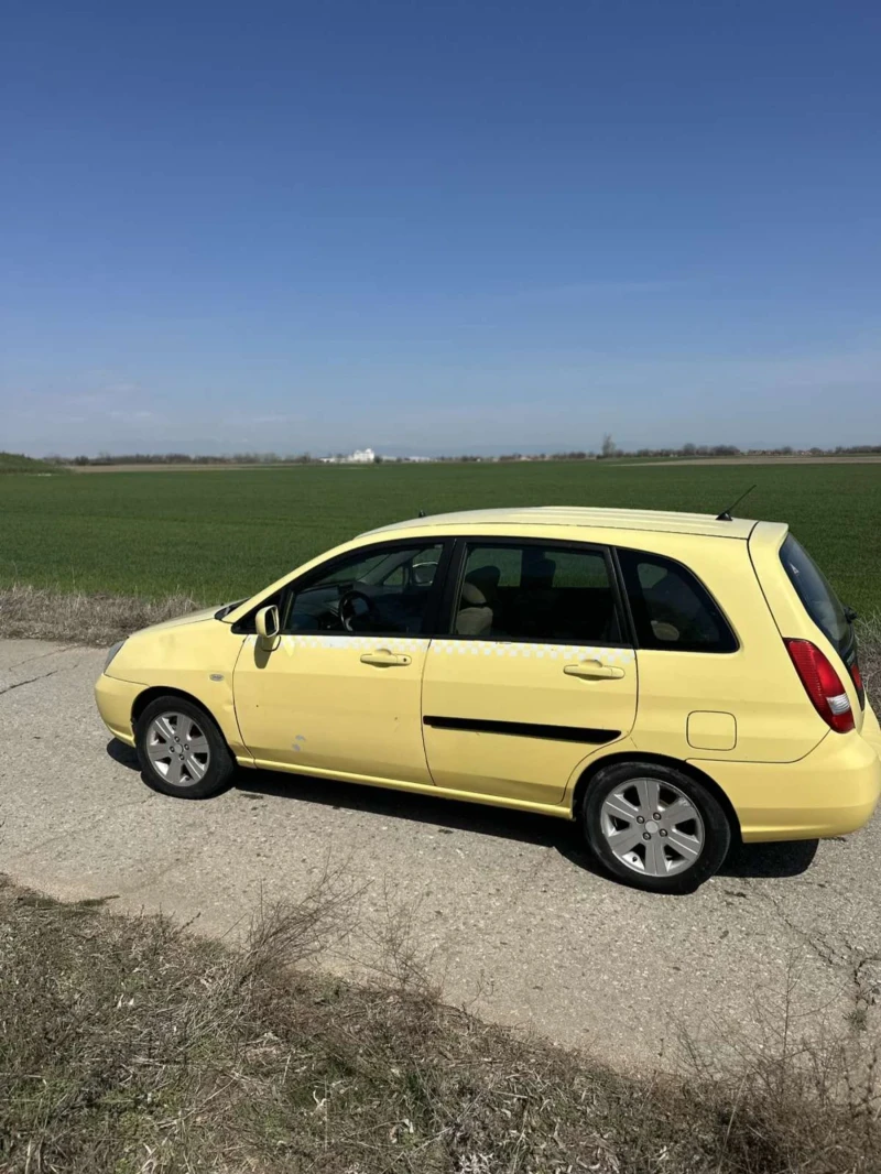 Suzuki Liana КЛИМАТИК , снимка 4 - Автомобили и джипове - 49608651