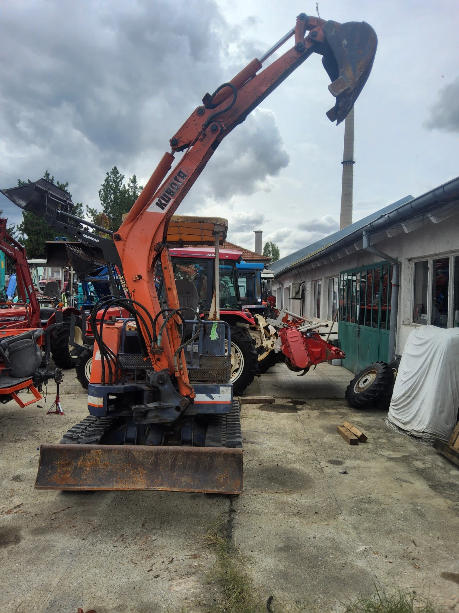 Багер Kubota KH- 021