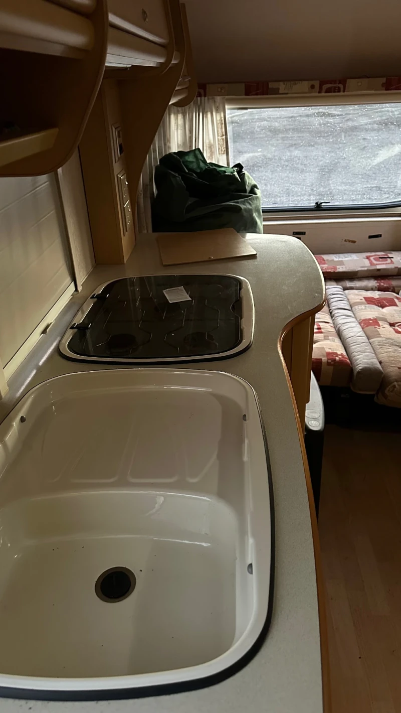 Каравана Bailey Discovery 200, снимка 12 - Каравани и кемпери - 52555276