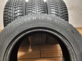 Гуми Зимни 235/65R17, снимка 8 - Гуми и джанти - 52664193