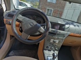 Opel Astra 1.6.   105кс., снимка 11 - Автомобили и джипове - 45252778