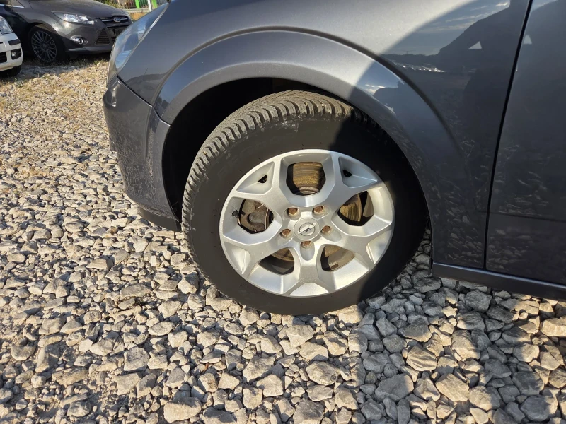 Opel Astra * klima* xenon, снимка 7 - Автомобили и джипове - 51905530