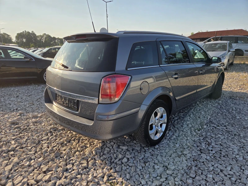 Opel Astra * klima* xenon, снимка 3 - Автомобили и джипове - 51905530
