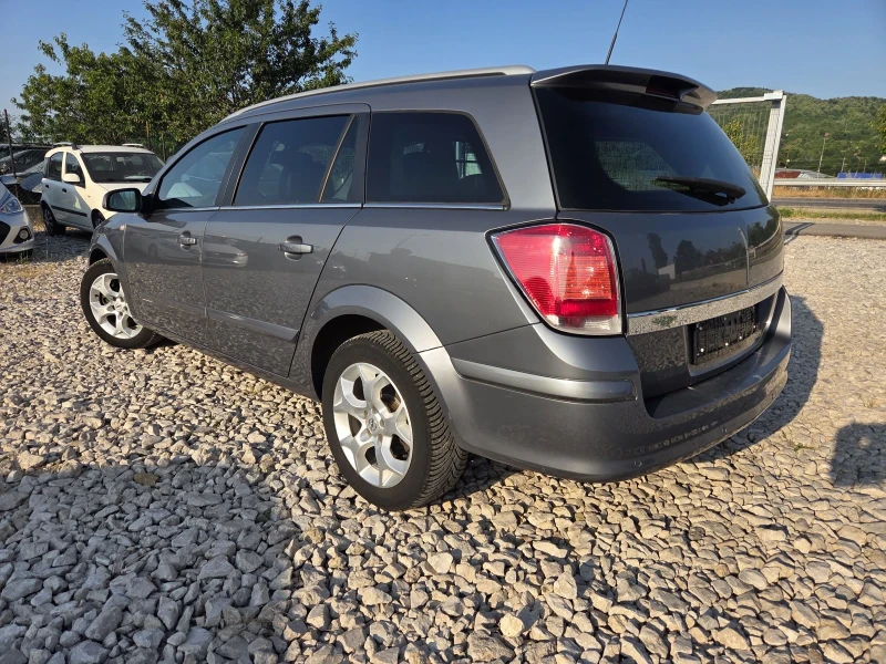 Opel Astra * klima* xenon, снимка 4 - Автомобили и джипове - 51905530