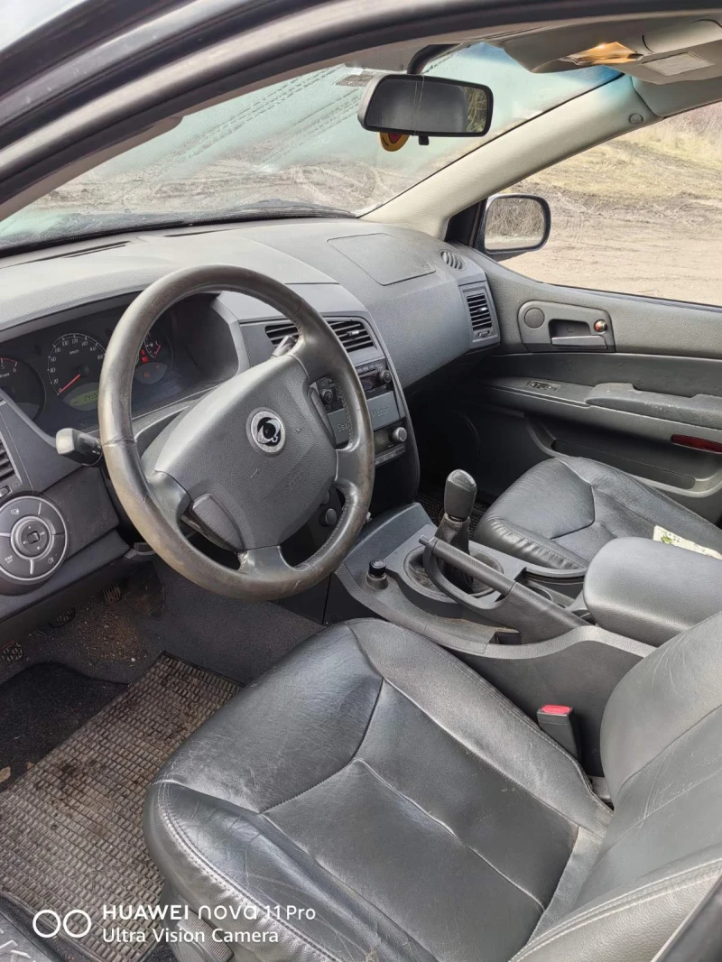 SsangYong Kyron 2.0 xdi, снимка 7 - Автомобили и джипове - 52380076
