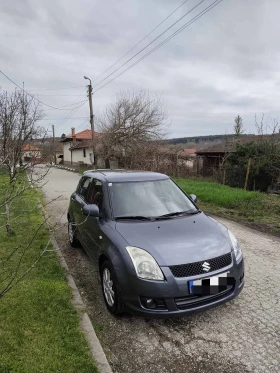 Suzuki Swift 1.3 4X4, снимка 1