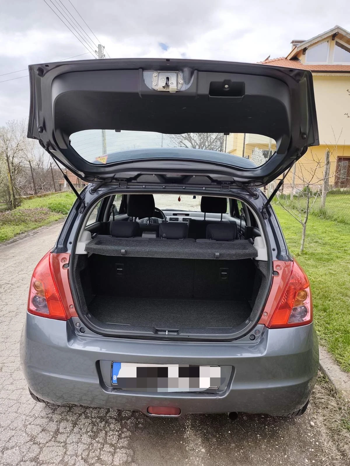 Suzuki Swift 1.3 4X4, снимка 5 - Автомобили и джипове - 54059758