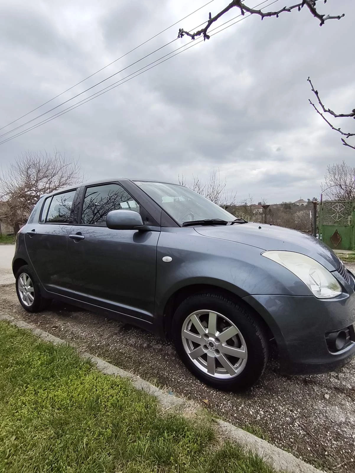 Suzuki Swift 1.3 4X4, снимка 10 - Автомобили и джипове - 54059758
