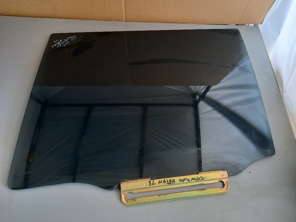 Стъкло задно ляво Мазда Примаси 