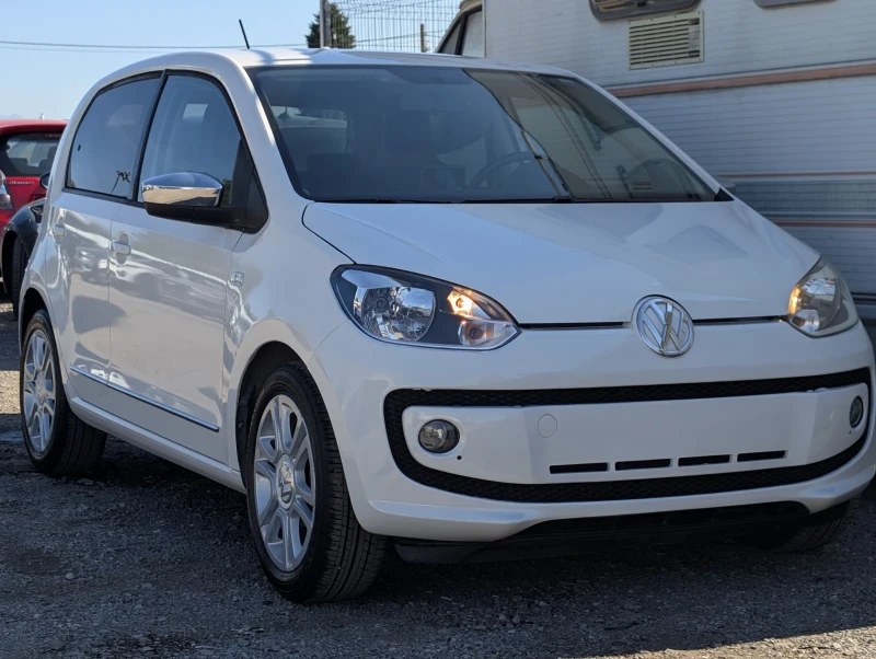 VW Up 1.0i* Нави Garmin* като нова, снимка 3 - Автомобили и джипове - 51537579