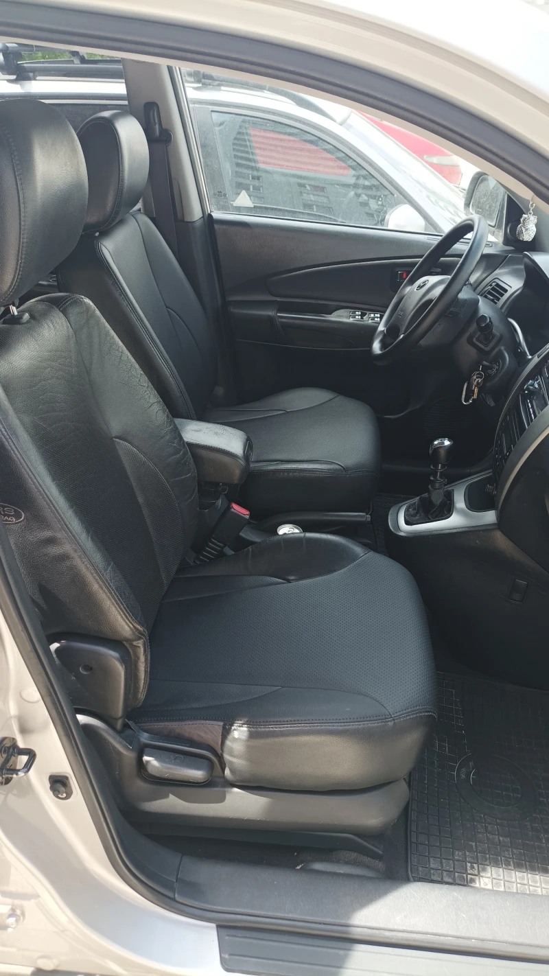 Hyundai Tucson 4x4, снимка 11 - Автомобили и джипове - 52070612
