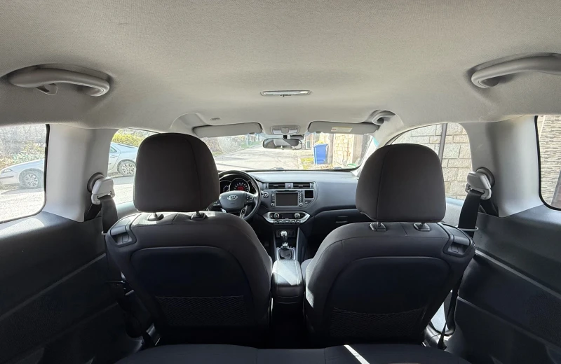 Kia Rio 1.4i-109k.c-KEYLESS-NAVI-PARKTRONIC, снимка 13 - Автомобили и джипове - 52530426