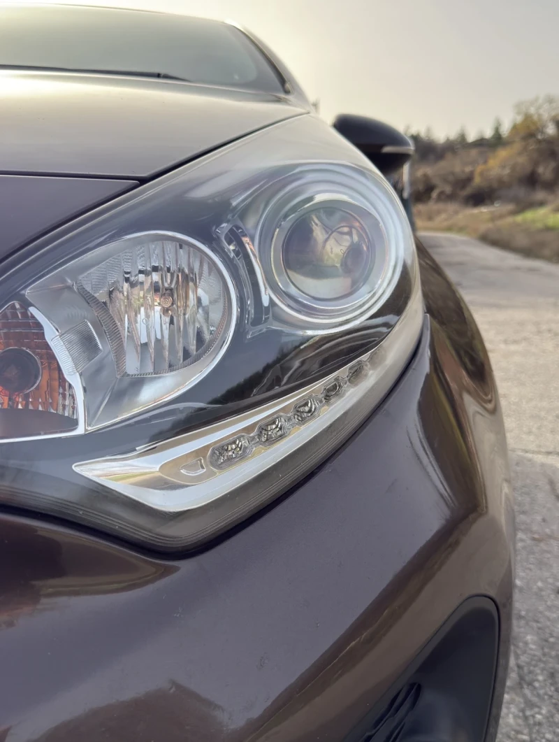 Kia Rio 1.4i-109k.c-KEYLESS-NAVI-PARKTRONIC, снимка 7 - Автомобили и джипове - 52530426