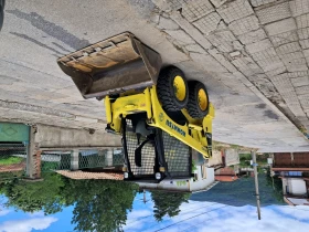 Мини челни товарачи Komatsu SK714, снимка 3
