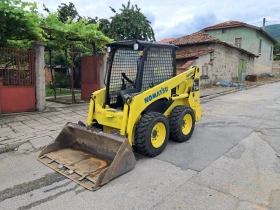 Мини челни товарачи Komatsu SK714, снимка 1