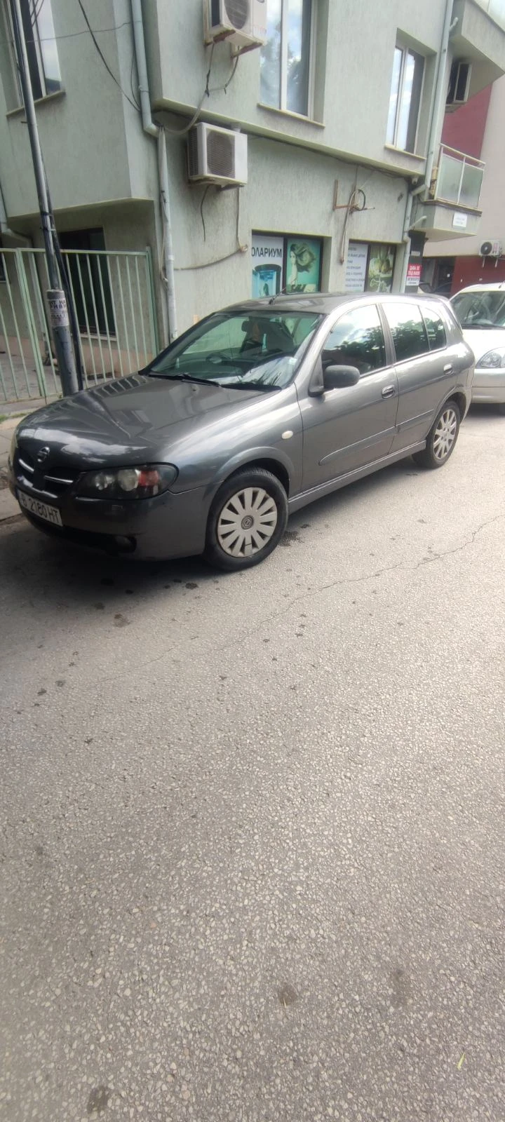 Nissan Almera 1.5, снимка 3 - Автомобили и джипове - 55218536