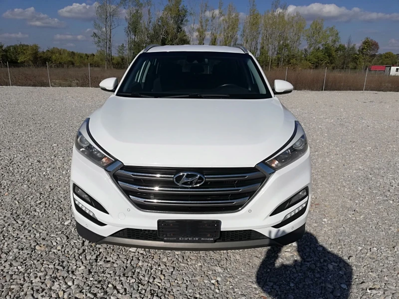 Hyundai Tucson 2.0CRDI AVTOMAT 4x4 IT, снимка 2 - Автомобили и джипове - 47603163