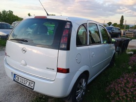 Opel Meriva 1.3, снимка 6 - Автомобили и джипове - 45608571
