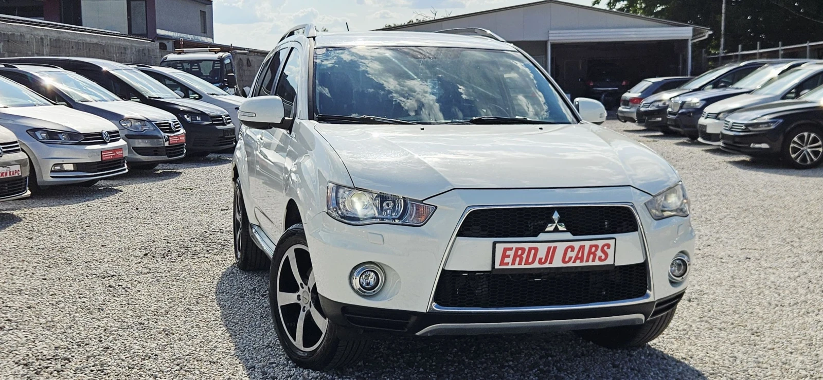 Mitsubishi Outlander 2.2DID* NAVI* XENON* KAMERA* ПОЛУКОЖА, снимка 2 - Автомобили и джипове - 55270442