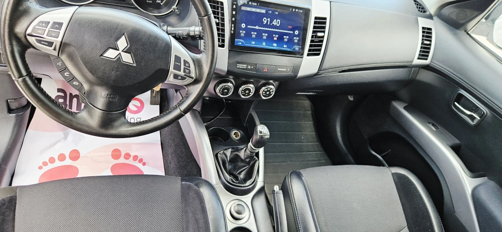 Mitsubishi Outlander 2.2DID* NAVI* XENON* KAMERA* ПОЛУКОЖА, снимка 15 - Автомобили и джипове - 55270442