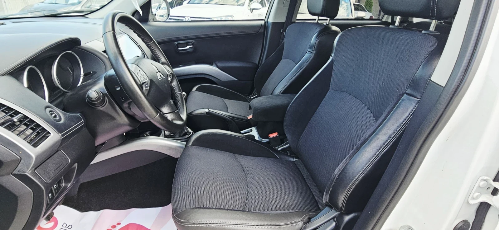 Mitsubishi Outlander 2.2DID* NAVI* XENON* KAMERA* ПОЛУКОЖА, снимка 12 - Автомобили и джипове - 55270442