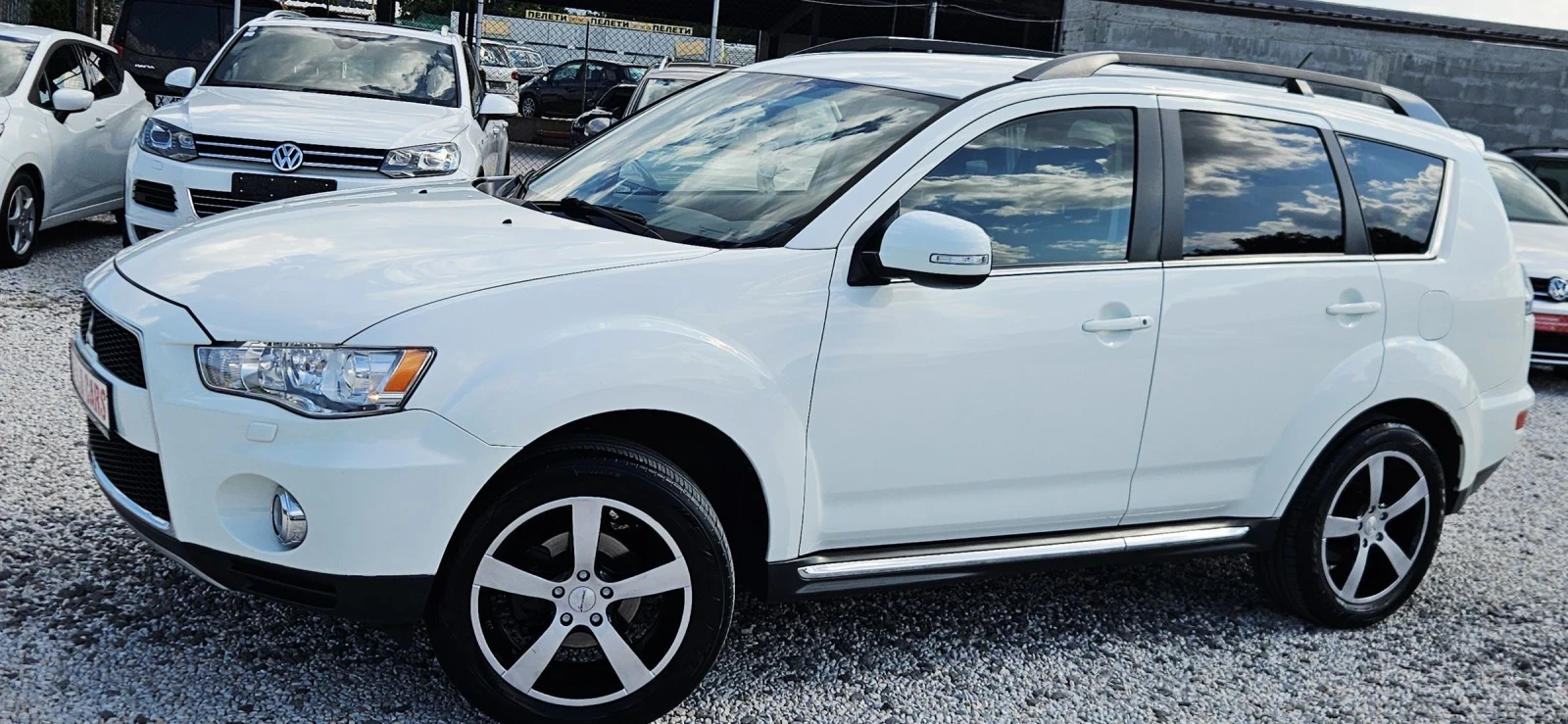 Mitsubishi Outlander 2.2DID* NAVI* XENON* KAMERA* ПОЛУКОЖА, снимка 8 - Автомобили и джипове - 55270442