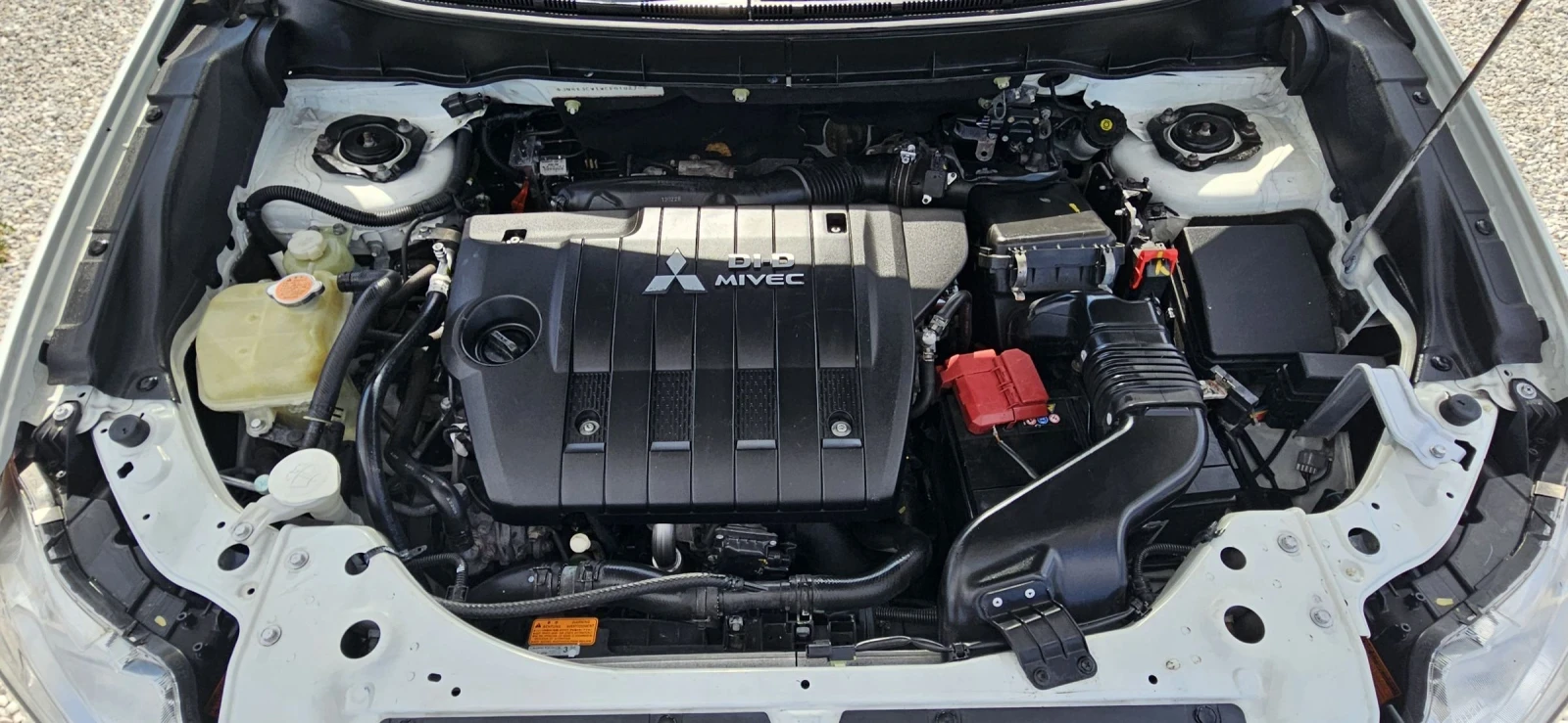 Mitsubishi Outlander 2.2DID* NAVI* XENON* KAMERA* ПОЛУКОЖА, снимка 16 - Автомобили и джипове - 55270442