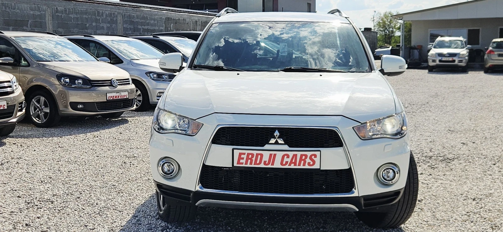 Mitsubishi Outlander 2.2DID* NAVI* XENON* KAMERA* ПОЛУКОЖА, снимка 5 - Автомобили и джипове - 55270442
