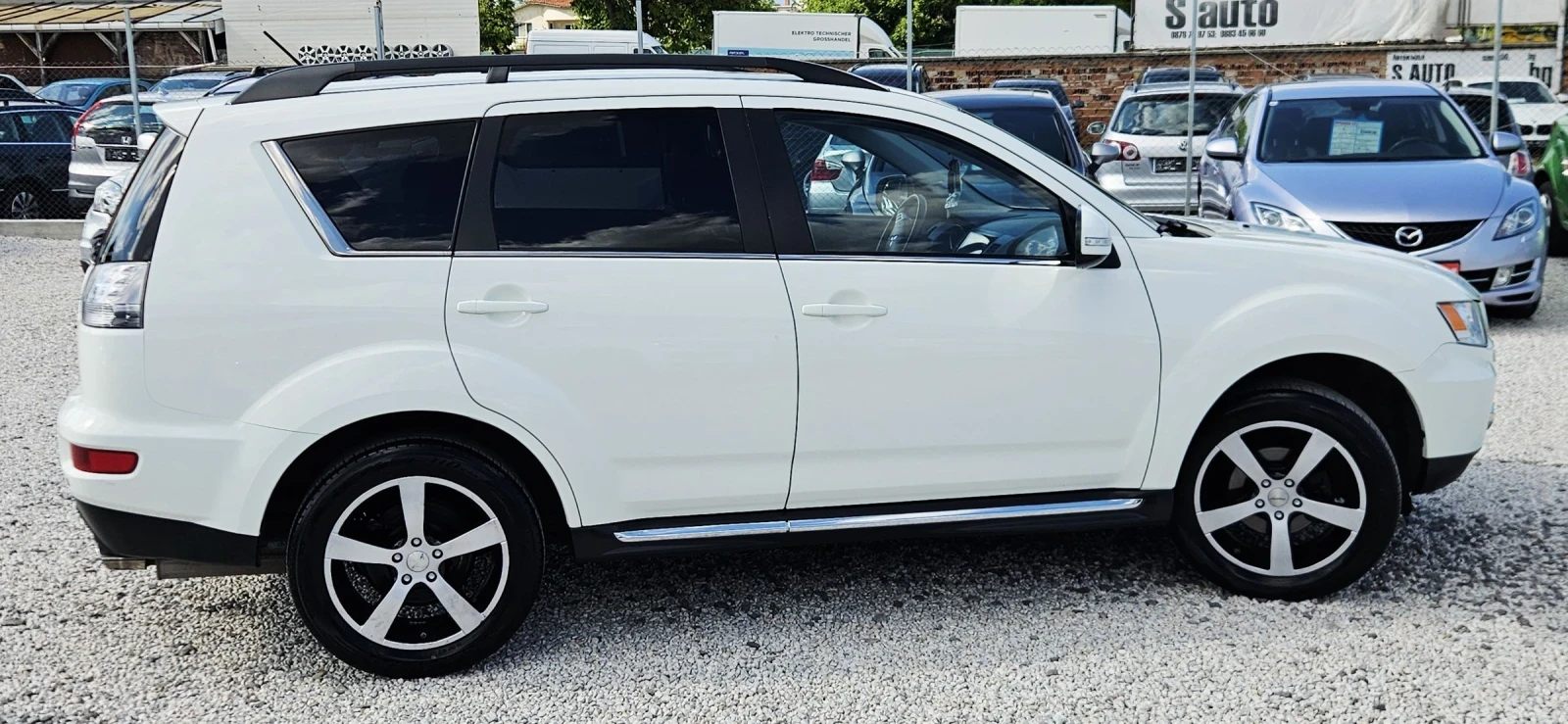 Mitsubishi Outlander 2.2DID* NAVI* XENON* KAMERA* ПОЛУКОЖА, снимка 9 - Автомобили и джипове - 55270442