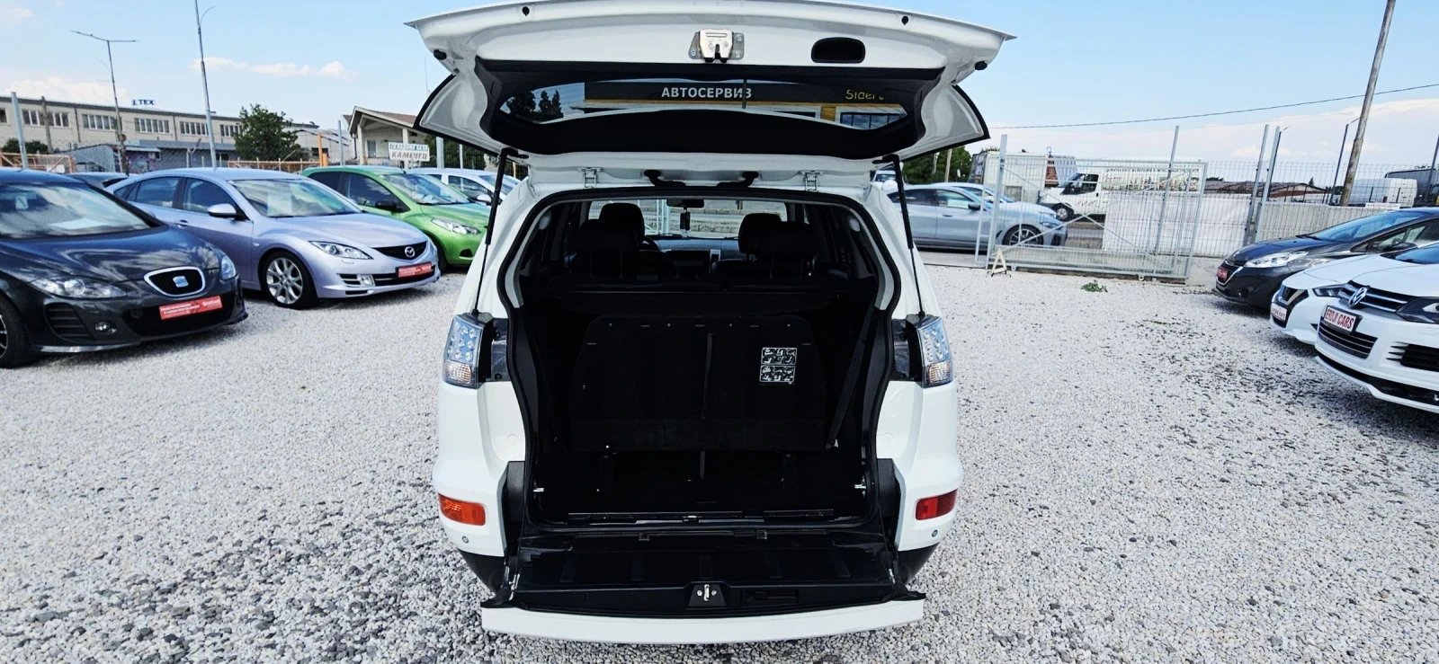 Mitsubishi Outlander 2.2DID* NAVI* XENON* KAMERA* ПОЛУКОЖА, снимка 11 - Автомобили и джипове - 55270442