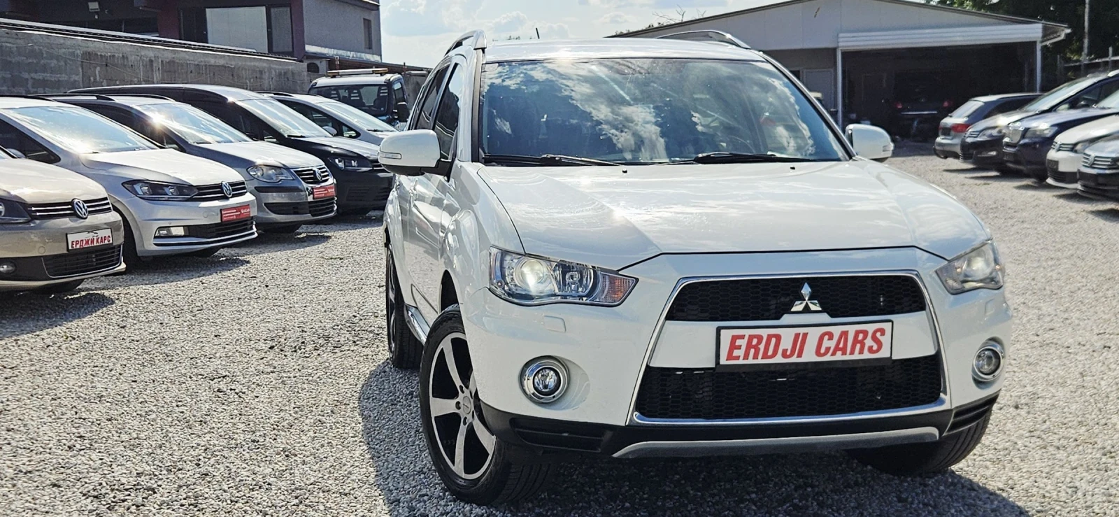 Mitsubishi Outlander 2.2DID* NAVI* XENON* KAMERA* ПОЛУКОЖА, снимка 4 - Автомобили и джипове - 55270442
