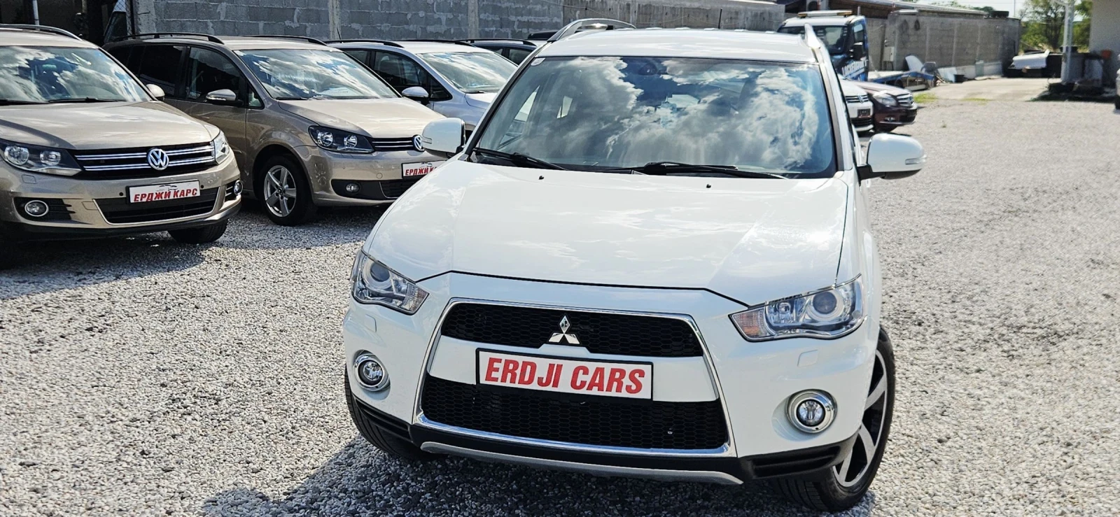 Mitsubishi Outlander 2.2DID* NAVI* XENON* KAMERA* ПОЛУКОЖА, снимка 13 - Автомобили и джипове - 55270442