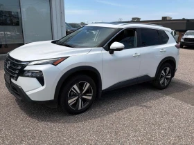 ������ Nissan Rogue