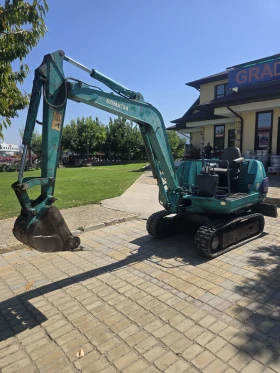 Багер Komatsu PC 10