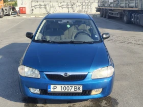 Mazda 323, снимка 1