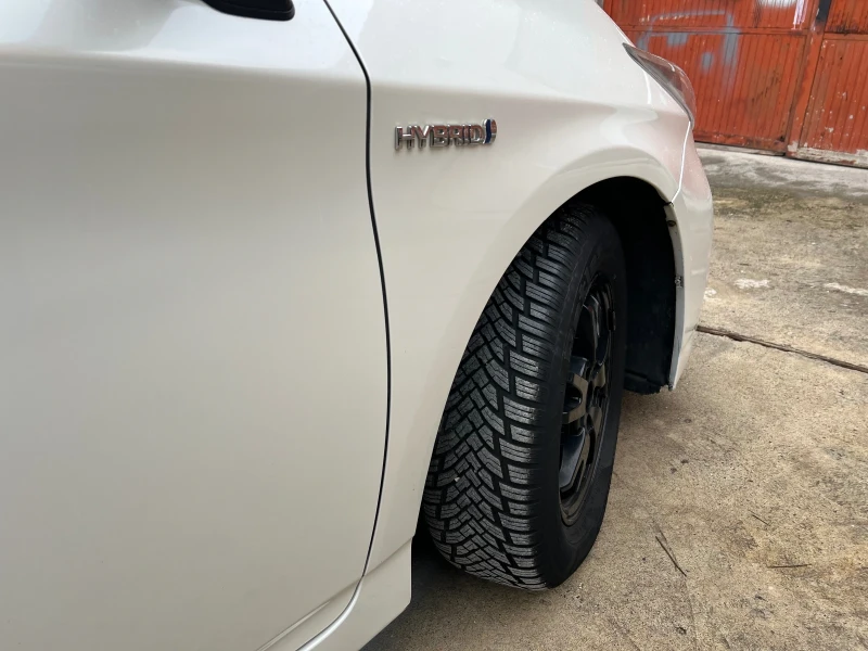 Toyota Prius 1.8 Dual VVT-i, снимка 17 - Автомобили и джипове - 53078130