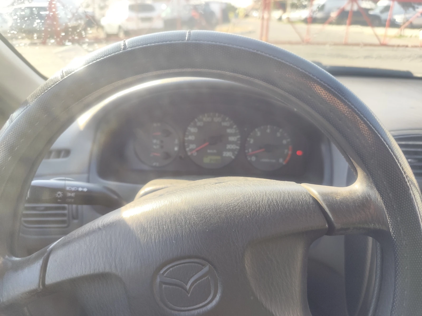 Mazda 323, снимка 9 - Автомобили и джипове - 55562416