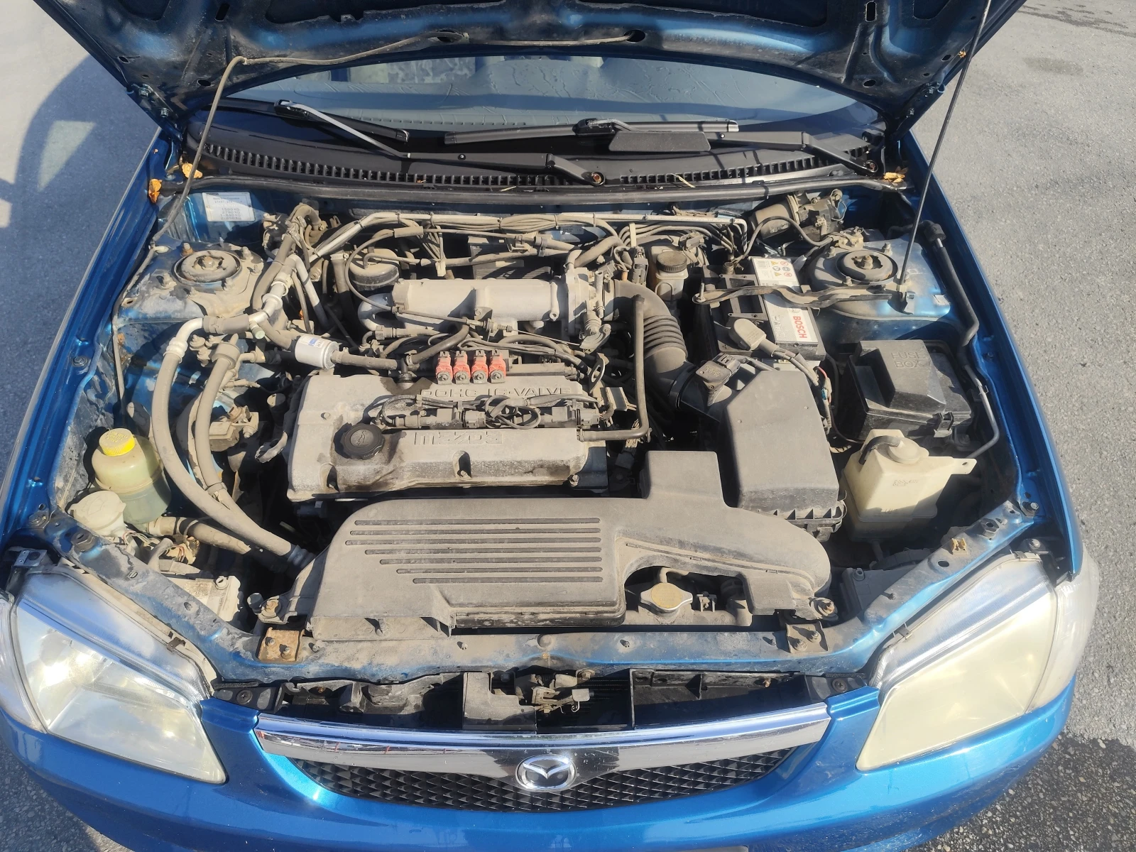 Mazda 323, снимка 12 - Автомобили и джипове - 55562416