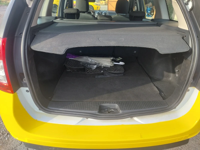 Dacia Logan, снимка 7 - Автомобили и джипове - 52492290