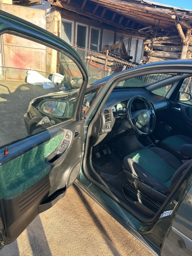 Opel Zafira 2.0, снимка 12 - Автомобили и джипове - 53133969