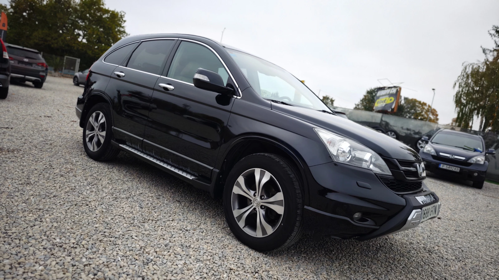 Honda Cr-v EXECUTIVE/AERO/СПОЙЛЕР/СТЕПЕНКИ/РОЛБАР/NAV/DVD/KAM - изображение 6