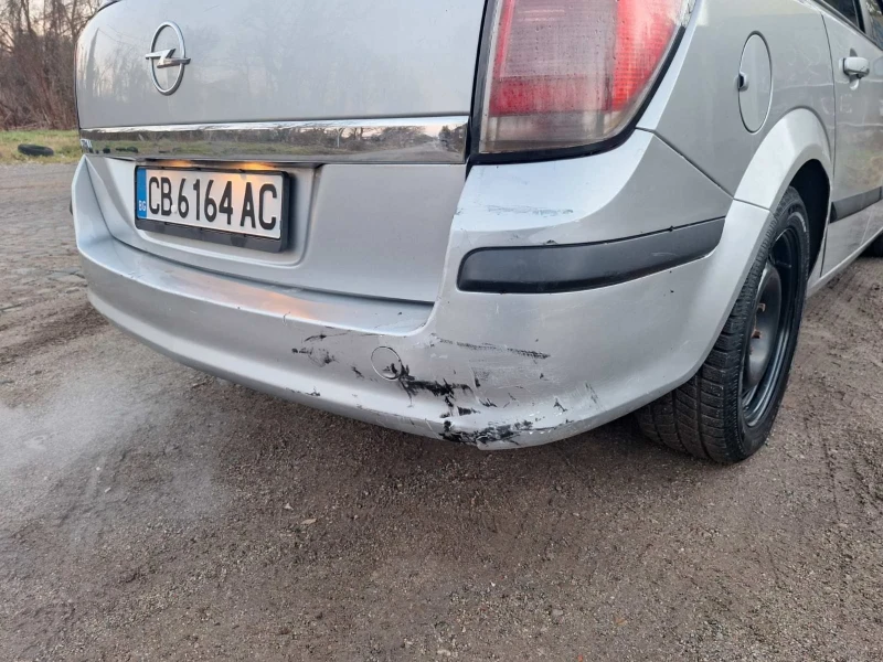 Opel Astra, снимка 14 - Автомобили и джипове - 48120331