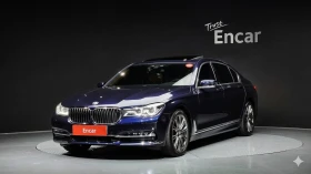 BMW 750 SOFT CLOSE* TV* ЩОРИ* ОБДУХ* МАСАЖИ, снимка 1