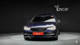 BMW 750 SOFT CLOSE* TV* ЩОРИ* ОБДУХ* МАСАЖИ, снимка 2