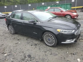 Ford Fusion Hybrid Titanium FWD - изображение 1